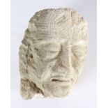 Stone carved head of an elderly gentleman with prominent features, 22cm high