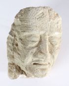 Stone carved head of an elderly gentleman with prominent features, 22cm high