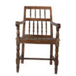 19th Century French armchair, the bar back dated 1881 above turned spindles and a solid seat on