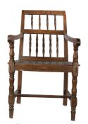 19th Century French armchair, the bar back dated 1881 above turned spindles and a solid seat on