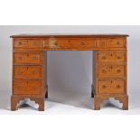 Victorian oak kneehole desk, the rectangular top above three frieze drawers and three drawers to
