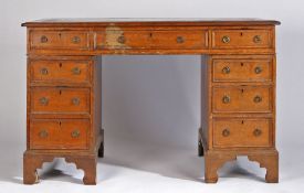 Victorian oak kneehole desk, the rectangular top above three frieze drawers and three drawers to