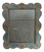 19th Century Italian wall mirror, having a wavy intricately embossed gilt metal border on a