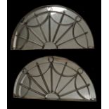 Pair of Georgian wrought iron sectional fan lights, each with new mirrors, 113cm wide (2)