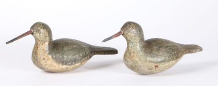 Two decoy birds, painted in greys and browns, 31cm long, (2)
