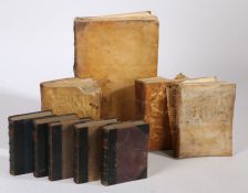 Collection of four 17th Century vellum bound books, together with a set of five leather bound