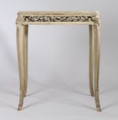 Carved wood and marble topped side table, the rectangular top with rounded corners above a carved