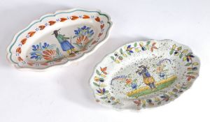 Two French Quimper ware dishes, both polychrome painted, 31cm wide and 33cm wide, (2)