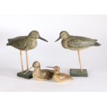 Collection of four decoy birds, two raised on stands and two without, 25cm long to 17cm long, (4)
