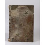 Large mid 18th Century leather bound book of music, dated MDCCL (1750), the leather binding with