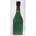Champagne Collery, an advertising painted panel in the form of a bottle of champagne, 34cm wide,