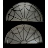Pair of Georgian wrought iron sectional fan lights, each with new mirrors, 112cm wide (2)