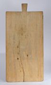 Substantial wooden bread board, with tapering handle to one end, 100cm wide, 48cm deep