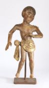 18th Century or earlier carved angel, the figure with arms angled, a gilt heightened wing and gilt