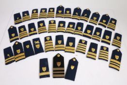 Collection of U.S. Coastguard bullion shoulder boards and buttons by Vanguard, (qty)