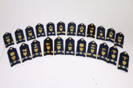 Collection of U.S. Coastguard bullion shoulder boards and buttons by Vanguard, (qty)