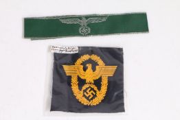 Reproduction German Third Reich Customs officials cuff title, together with a police arm badge, (2)