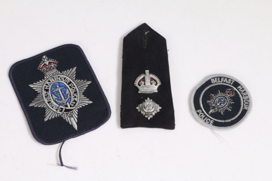 Police Superintendent rank epaulette, together with two Belfast Harbour Police cloth badges, (3)