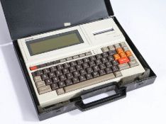 Epson PX-4+ 1980's portable based computer with built in printer housed with in its plastic travel