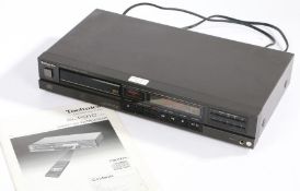 Technics Compact disc player SL-P310, serial number AH6J01B237 with operating instructions