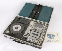 Sanyo Portable Music centre CENTRE model G-2615N-2, contained in a briefcase, the lid opens to