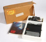 Sinclair ZX81 computer with programming book