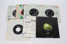 9x The Beatles 7" singles to include Come Together, Please Please Me, and All You Need Is Love