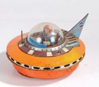 1950's/60's Japanese tin plate flying saucer and spaceman, 19cm diameter