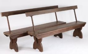 Pair of pine and iron swing back tram benches, each having pine back rests and seats, the iron