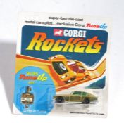Corgi Rockets Aston Martin DB6, in gold with green interior, with tune up key, unopened