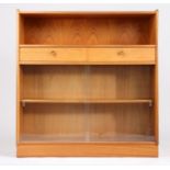 Nathan teak bookcase, with open top above two drawers and a pair of sliding glass doors, 102cm wide,