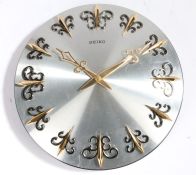 1970's Seiko Transistor wall clock, with stainless steel face and brass hands and batons, with