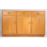 Blonde Ercol sideboard, fitted three drawers above three cupboard doors, 155cm long, 94cm high, 43.