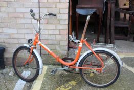 Super De Luxe folding bicycle in orange
