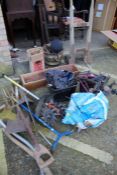 Collection of tools, to include long handled tools, scarifier, wooden sack barrow, clamps, spanners,