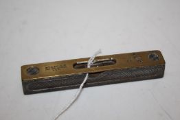 Stanley brass and steel spirit level, the body stamped "Stanley New Britain Conn. U.S.A" with