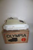 Olympia adding machine, in original box