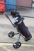 Set of Hippo golf clubs with trolley to include driving irons and putters