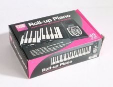 Pure Tone roll-up piano. Boxed and unused.