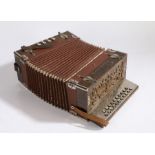 An Alvari accordion, with mother of pearl buttons wooden case with metal banding, 31cm high 28cm