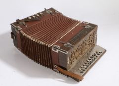 An Alvari accordion, with mother of pearl buttons wooden case with metal banding, 31cm high 28cm