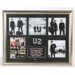 U2 autograph's, the central picture signed by Bono, The Edge, Larry Mullen and Adam Clayton,