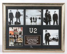 U2 autograph's, the central picture signed by Bono, The Edge, Larry Mullen and Adam Clayton,