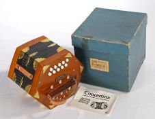 A 20th century German concertina, boxed