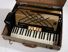 Hohner Virtuola III Piano Accordian in black, with case.