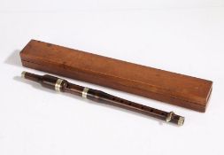 A lignum vitae Flageolet with a wooden box.