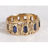 A 9 carat gold and sapphire bark effect ring, set with five baguette cut sapphires, weight 3.4 grams