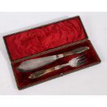 A late Victorian silver plated and horn handled fish service set, with silver ferrule and fish