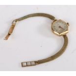 Avia 9 carat gold ladies wristwatch, the signed cream dial with Arabic and baton markers, date