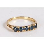 14 carat gold and sapphire ring, the head set with five claw mounted round cut sapphires, weight 1.6